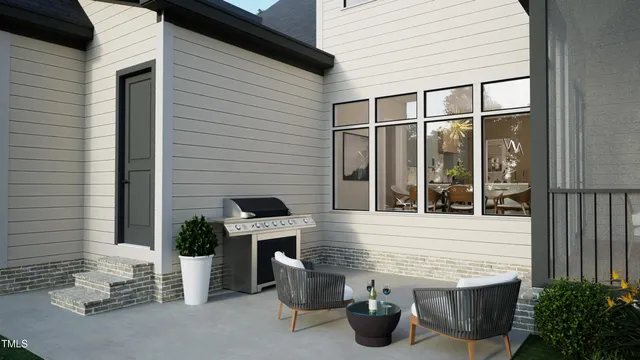 a backyard of a house with seating space