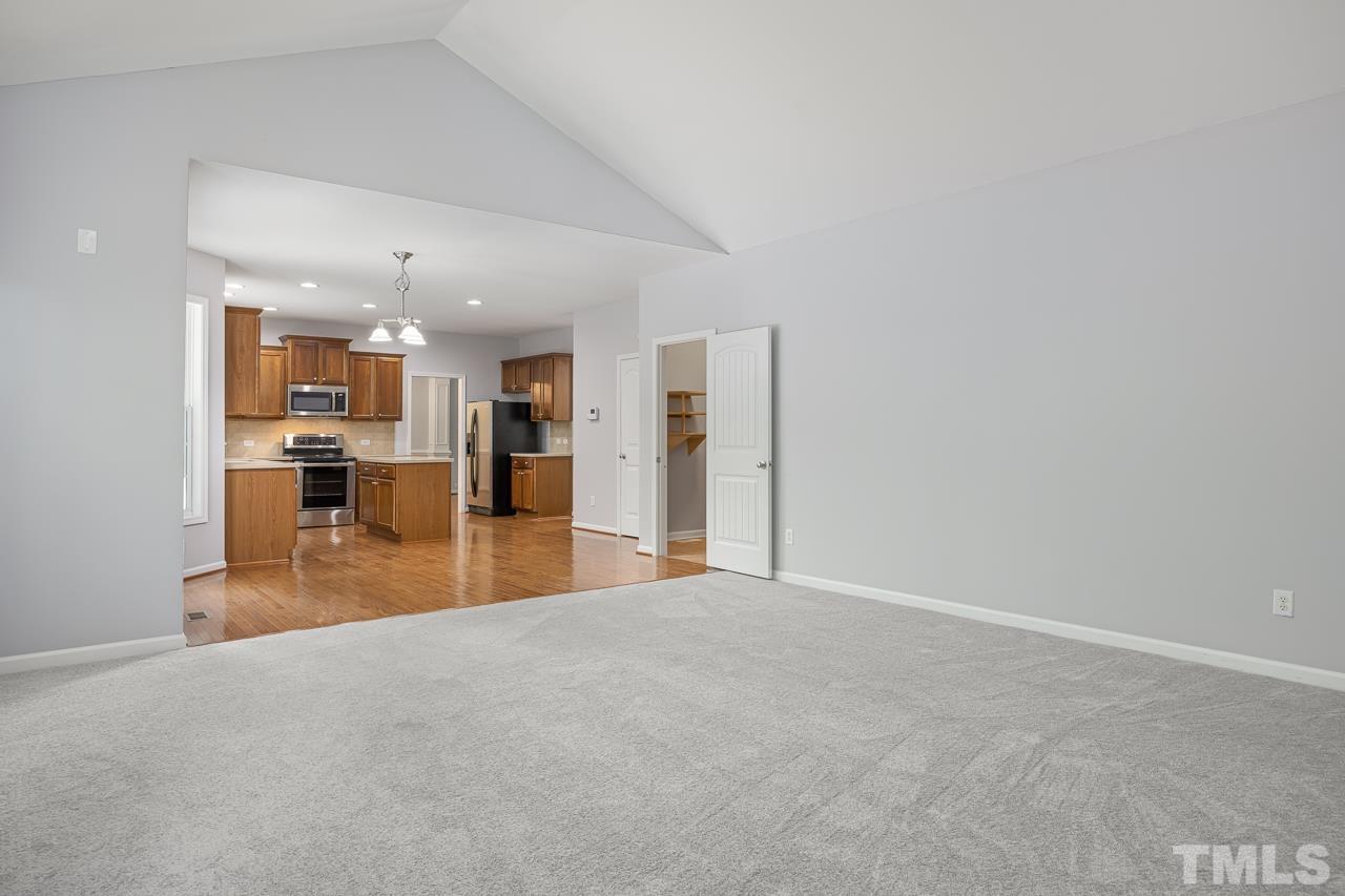 4506 Paces Ferry Drive Durham, NC 27712 - Photo 13 of 38 a view of a kitchen with a sink