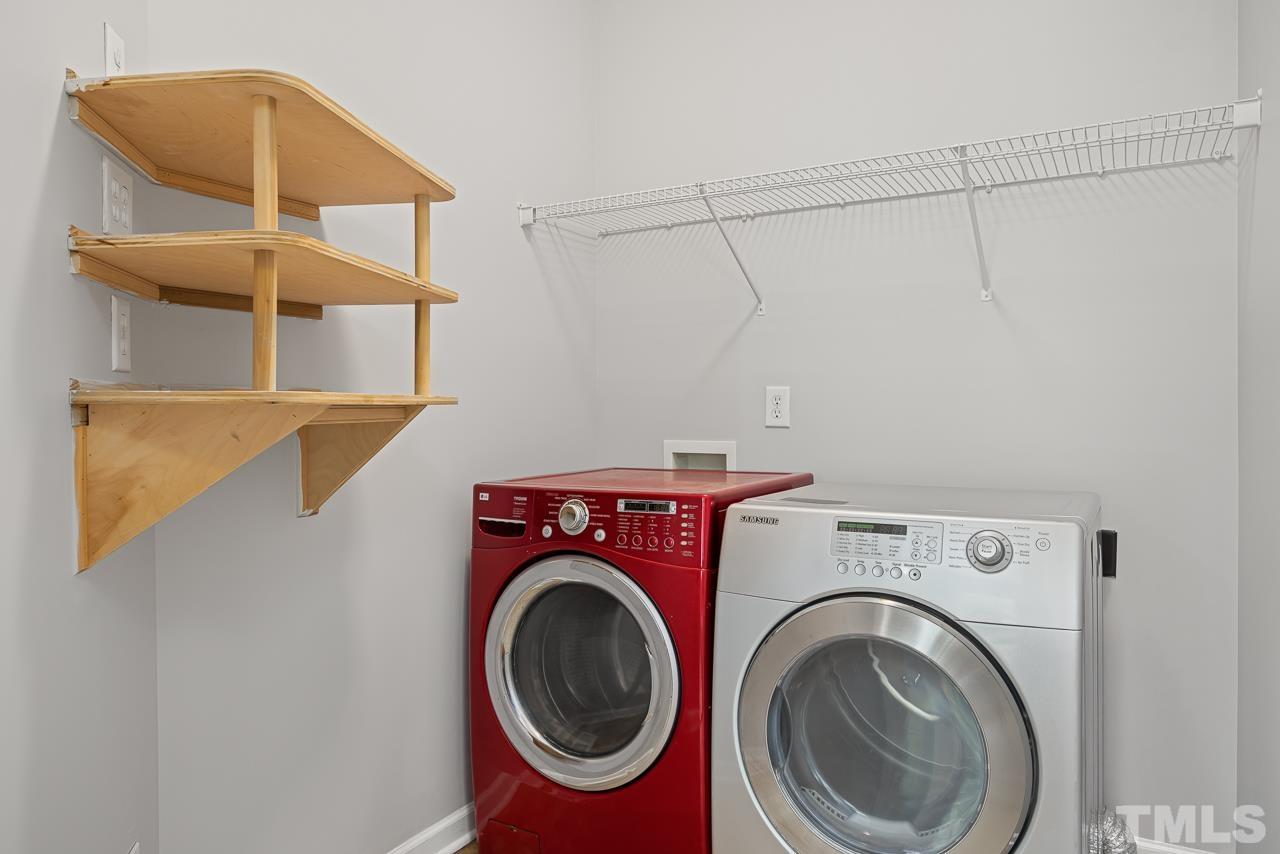 4506 Paces Ferry Drive Durham, NC 27712 - Photo 18 of 38 a utility room with dryer and washer