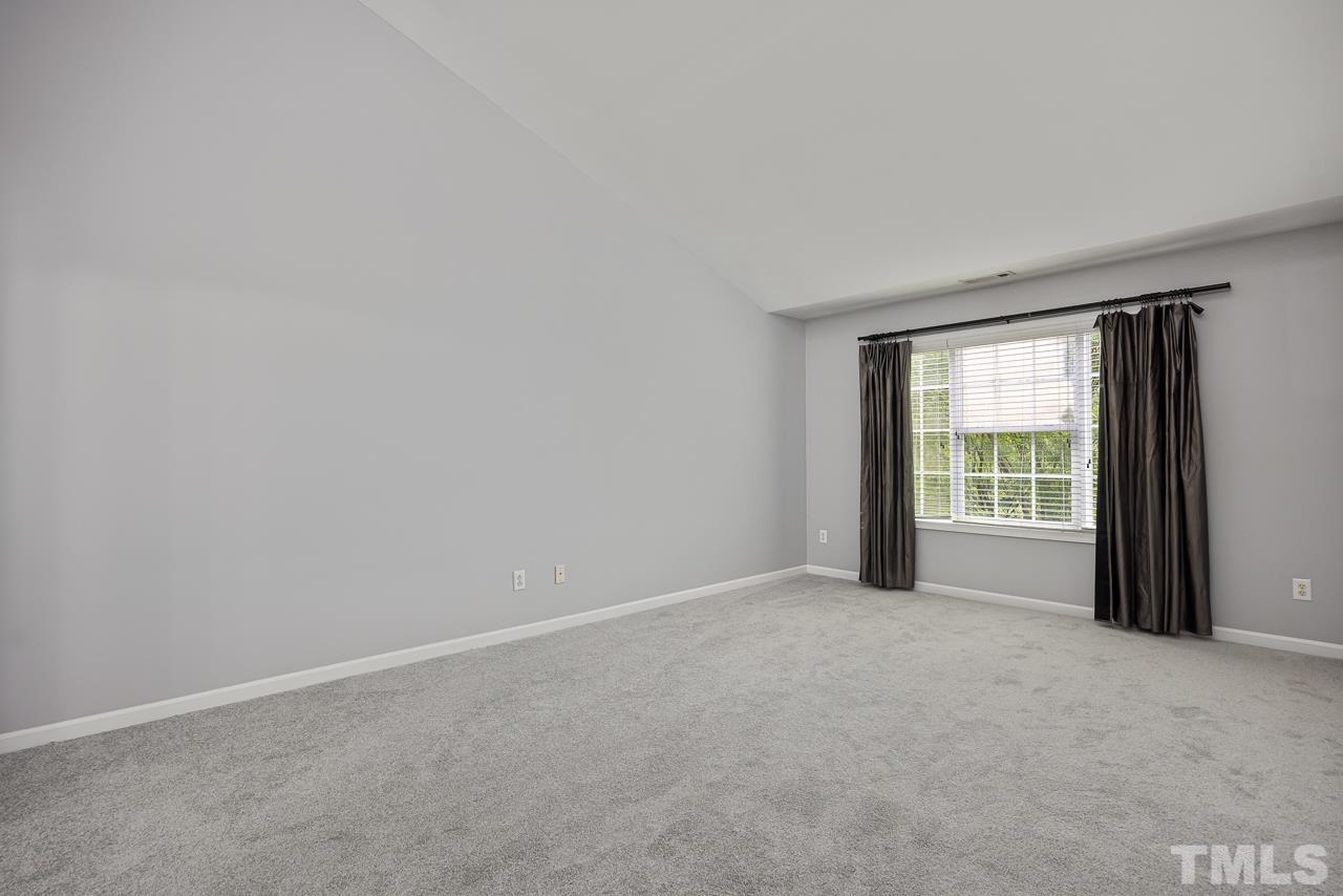 4506 Paces Ferry Drive Durham, NC 27712 - Photo 19 of 38 a view of an empty room with a window