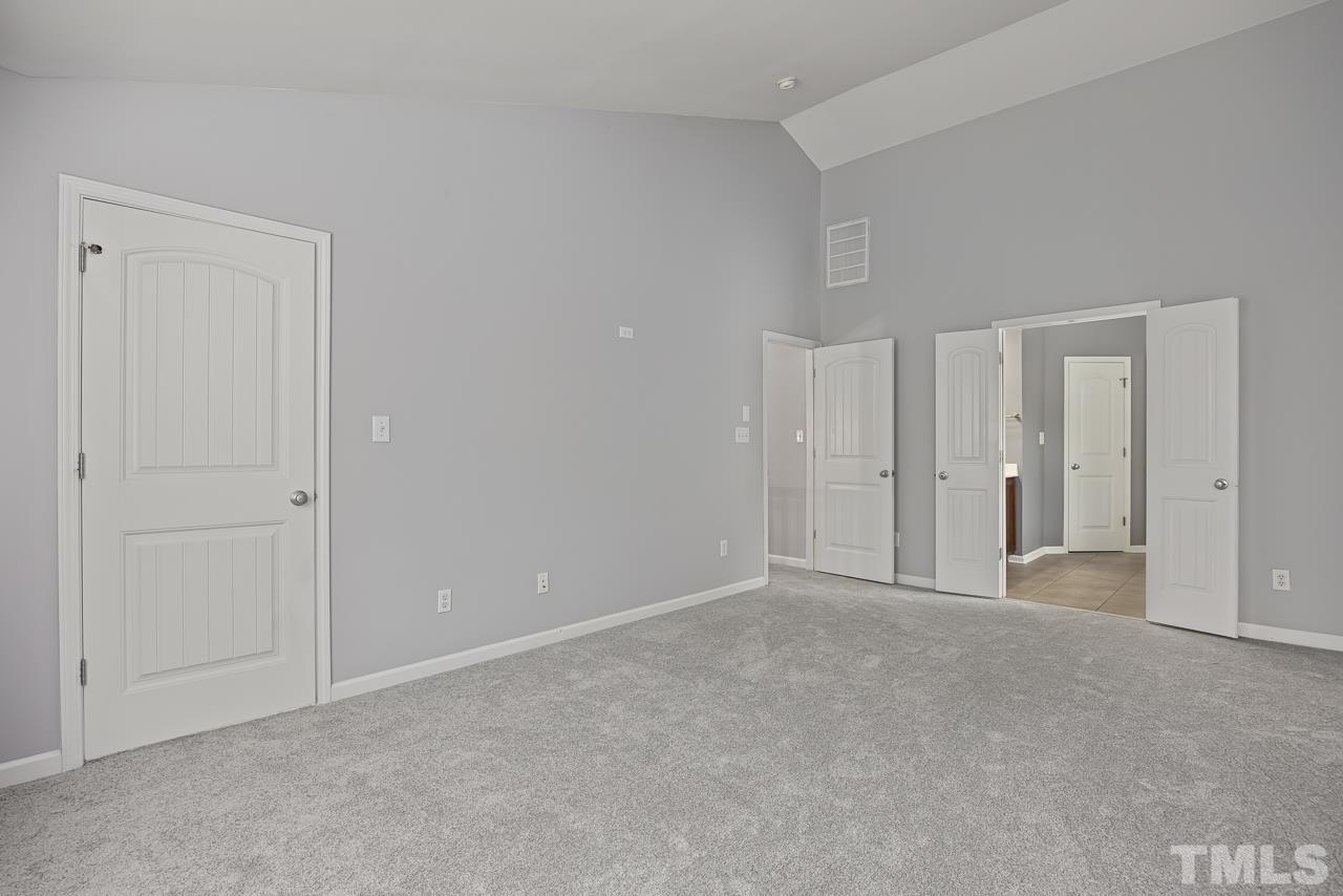 4506 Paces Ferry Drive Durham, NC 27712 - Photo 20 of 38 a view of an empty room and closet area