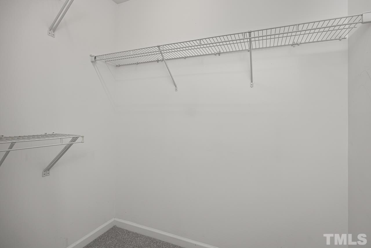 4506 Paces Ferry Drive Durham, NC 27712 - Photo 25 of 38 a view of a room with racks on the wall