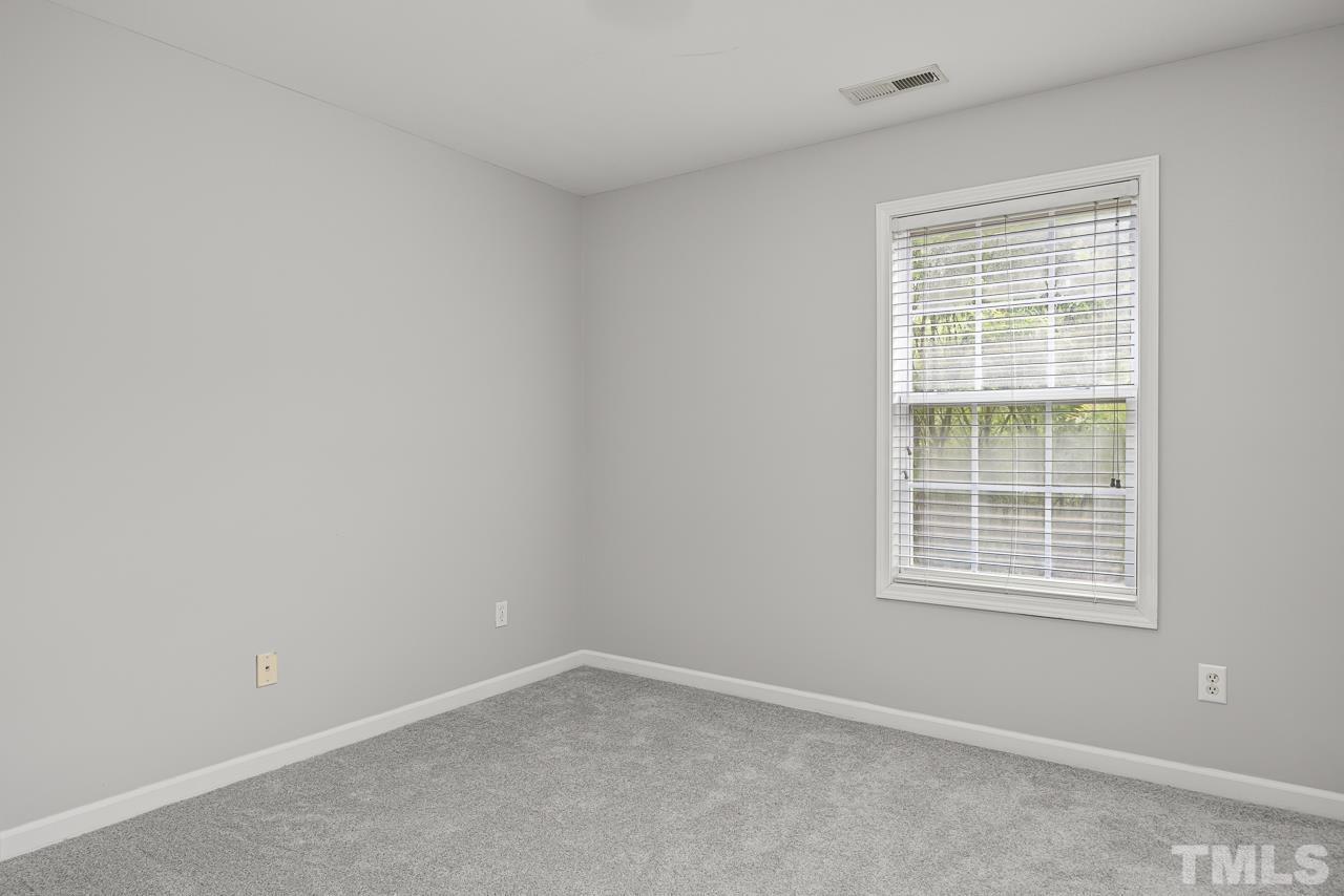 4506 Paces Ferry Drive Durham, NC 27712 - Photo 26 of 38 an empty room with a window