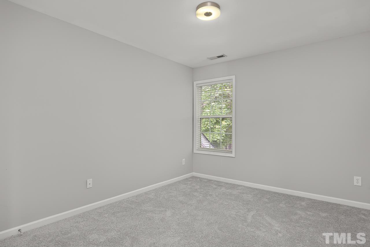 4506 Paces Ferry Drive Durham, NC 27712 - Photo 27 of 38 an empty room with a window