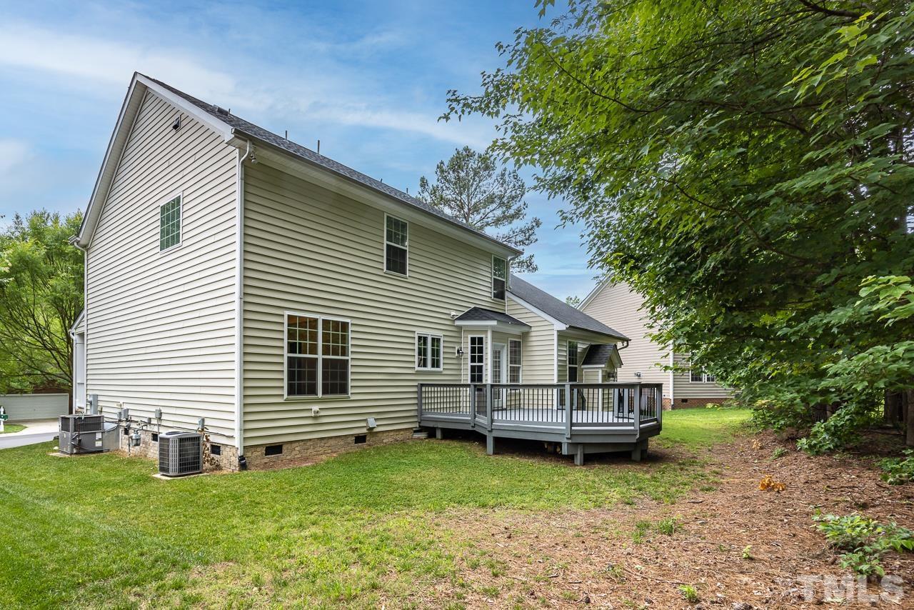 4506 Paces Ferry Drive Durham, NC 27712 - Photo 31 of 38 a view of a house with a backyard