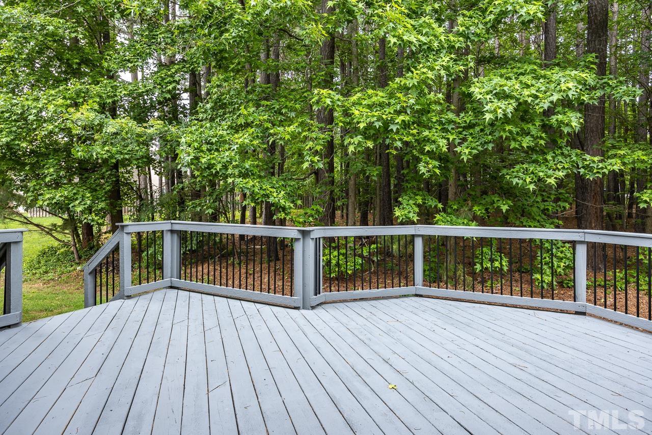 4506 Paces Ferry Drive Durham, NC 27712 - Photo 32 of 38 a balcony with wooden floor and fence