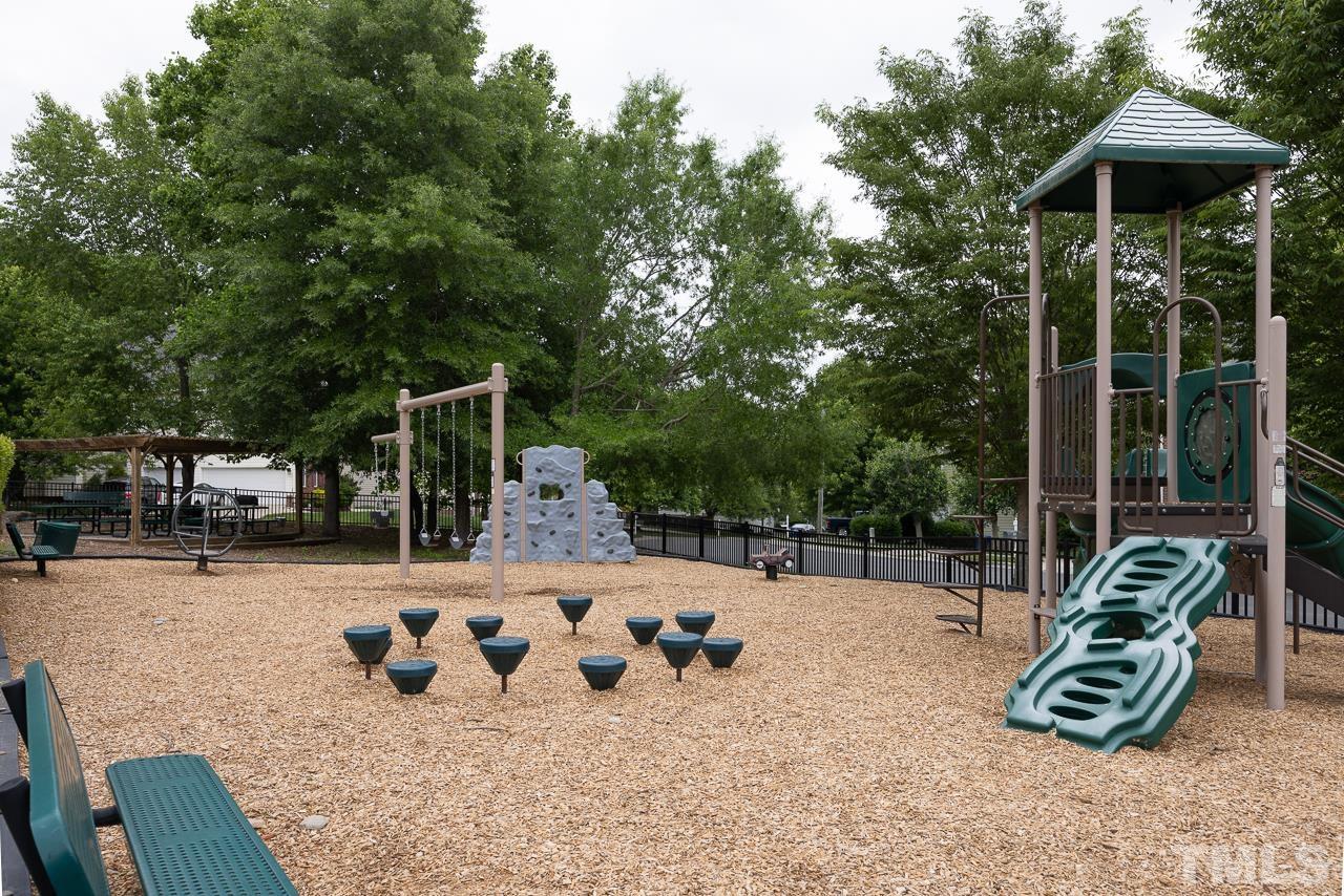 4506 Paces Ferry Drive Durham, NC 27712 - Photo 35 of 38 a outdoor space with furniture and garden