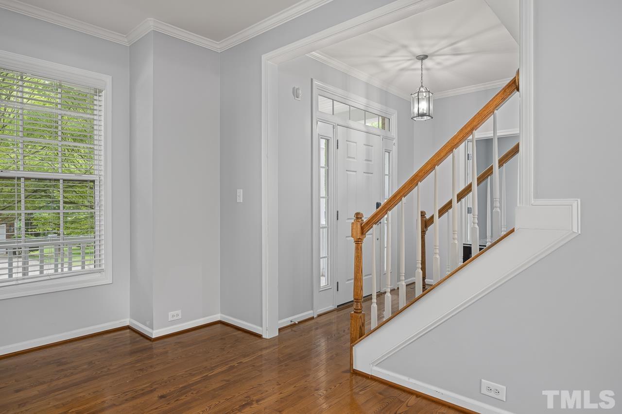4506 Paces Ferry Drive Durham, NC 27712 - Photo 6 of 38 a view of entryway with wooden floor