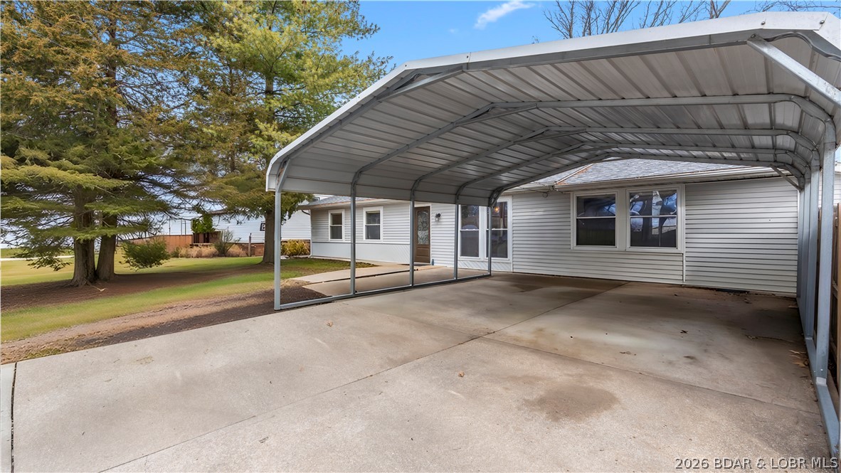 862 Malibu Road Osage Beach, MO 65065 - Photo 4 of 62 Large 2 car carport