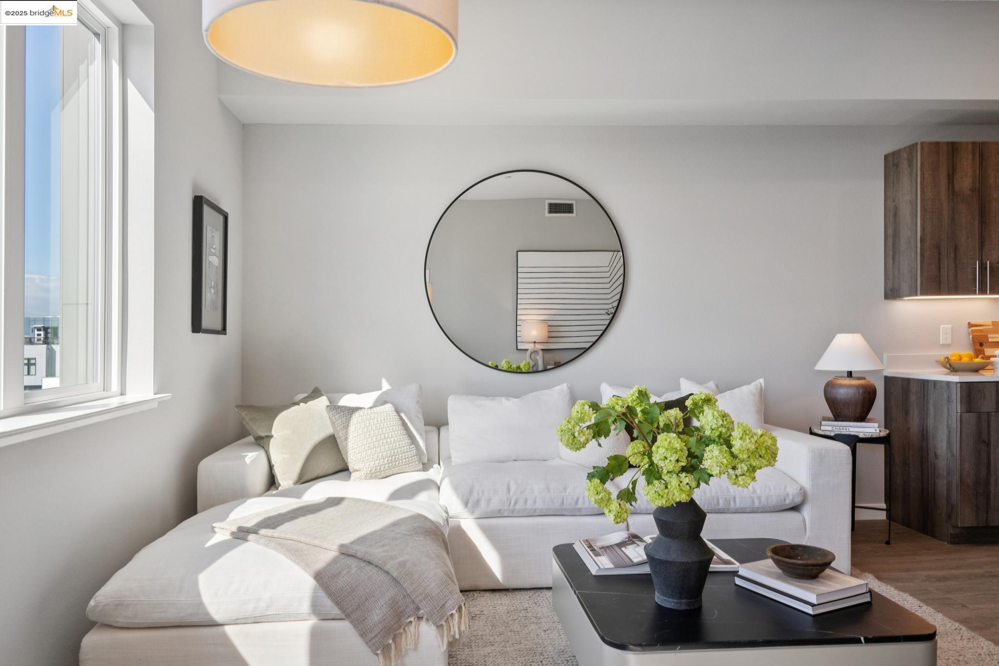 2400 Adeline Street, Unit 403 Oakland, CA 94607 - Photo 6 of 25 a bedroom with bed and a potted plant