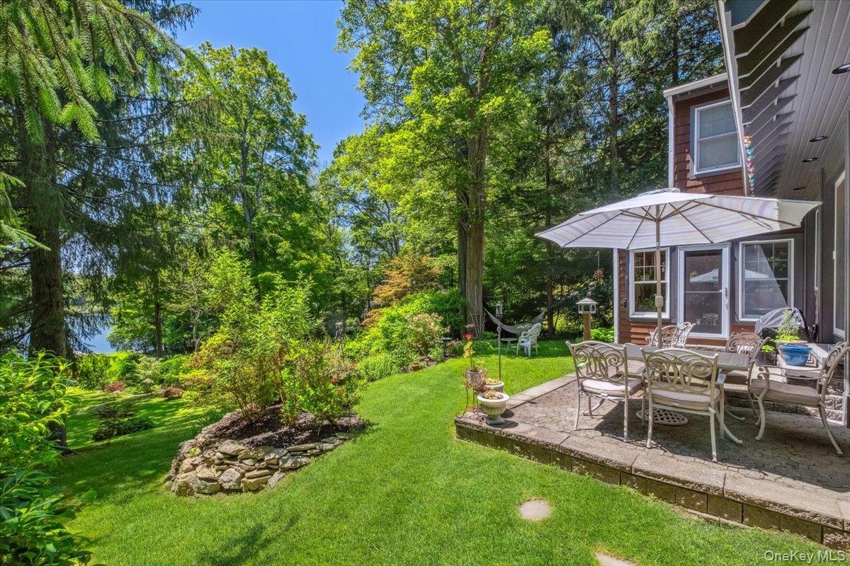 342 Lake Shore Road Putnam Valley, NY 10579 - Photo 32 of 46 View of grassy yard featuring a patio