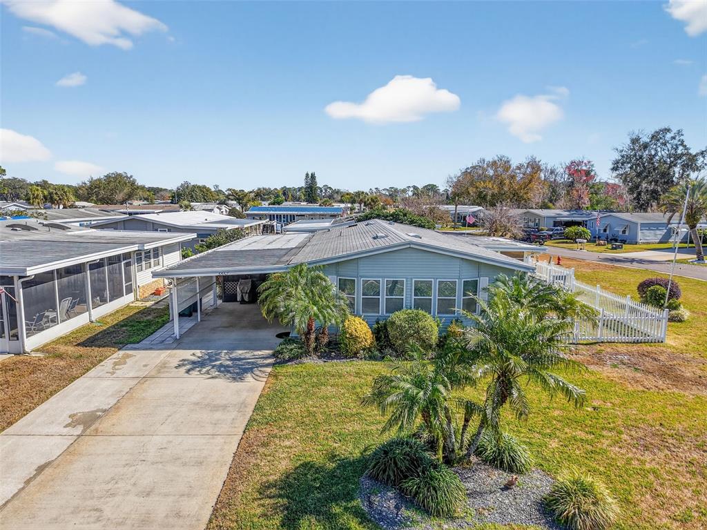 3567 Manatee Road Tavares, FL 32778 - Photo 2 of 45 a view of a swimming pool with a patio