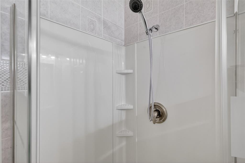 3567 Manatee Road Tavares, FL 32778 - Photo 25 of 45 a bathroom with a shower