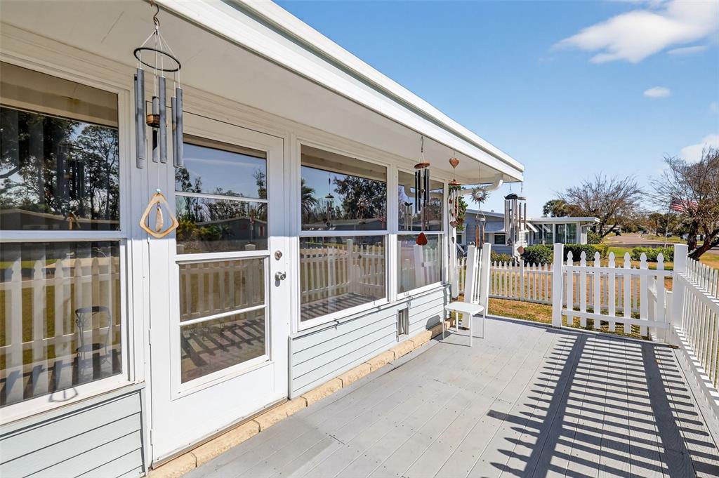 3567 Manatee Road Tavares, FL 32778 - Photo 36 of 45 a view of a building with a large window and glass door