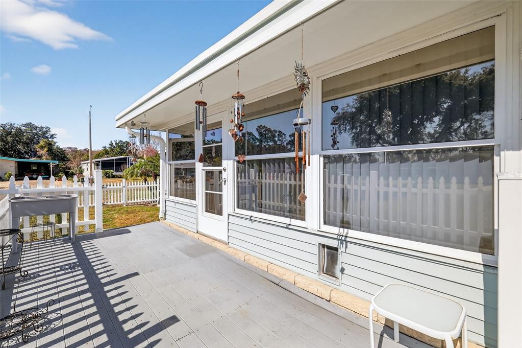 3567 Manatee Road Tavares, FL 32778 - Photo 37 of 45 a view of a house with a large window