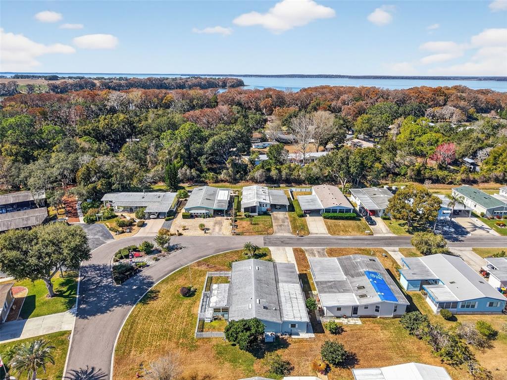 3567 Manatee Road Tavares, FL 32778 - Photo 38 of 67 an aerial view of a house with yard swimming pool and outdoor seating