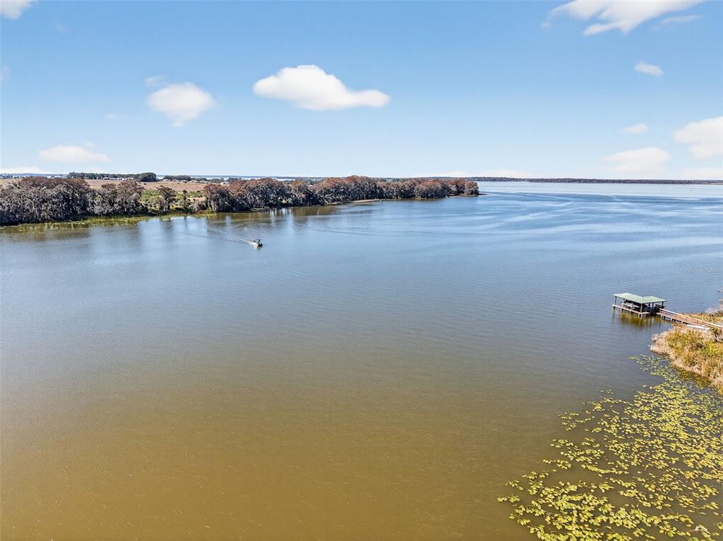 3567 Manatee Road Tavares, FL 32778 - Photo 41 of 45 a view of a lake with a lake