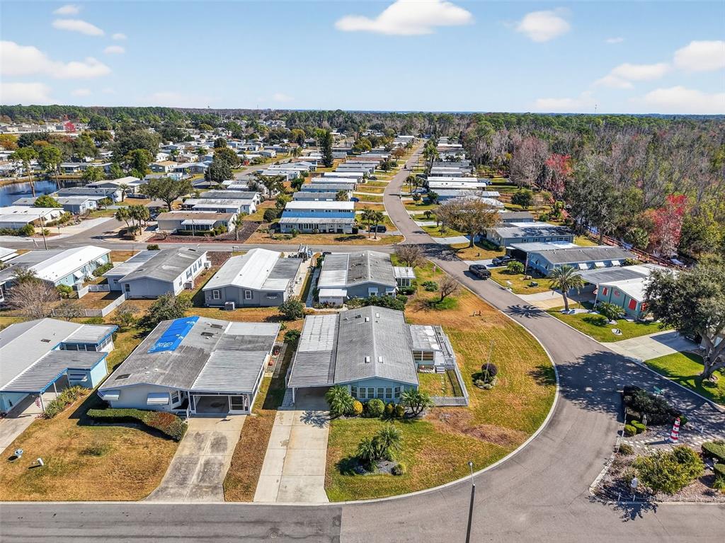 3567 Manatee Road Tavares, FL 32778 - Photo 43 of 45 an aerial view of residential houses with outdoor space