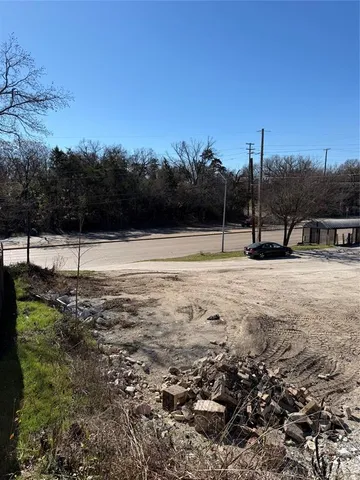 a view of a road with an empty space