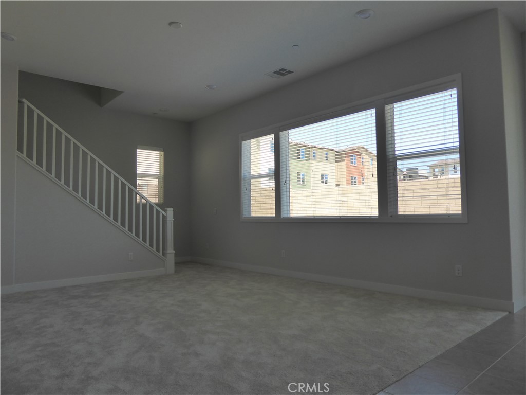 652 Athos Lake Forest, CA 92630 - Photo 5 of 13 a view of an empty room with a window