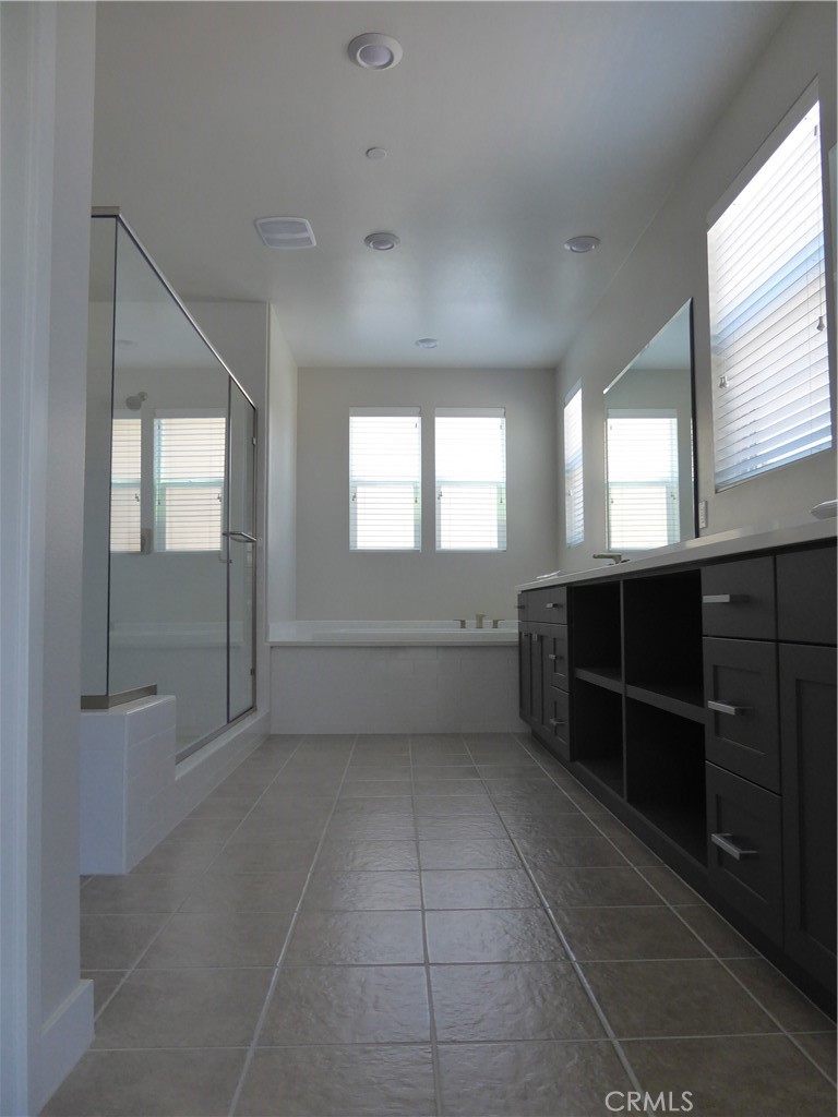 652 Athos Lake Forest, CA 92630 - Photo 7 of 13 a view of an empty room with a window