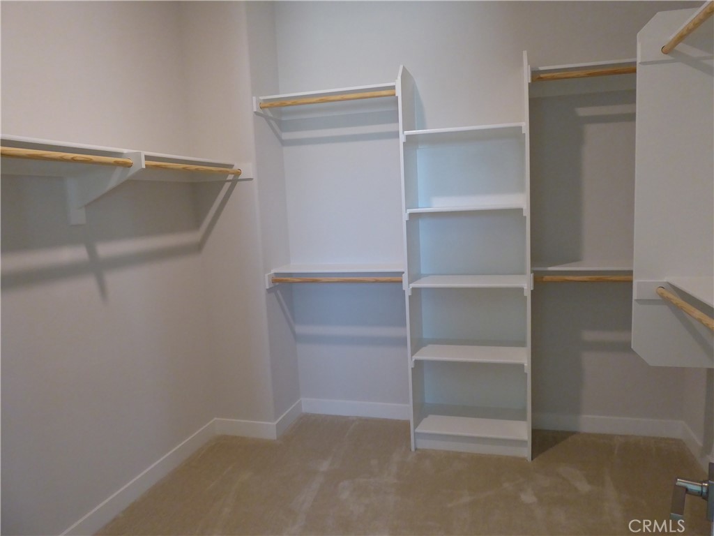 652 Athos Lake Forest, CA 92630 - Photo 9 of 13 a view of an empty walk in closet