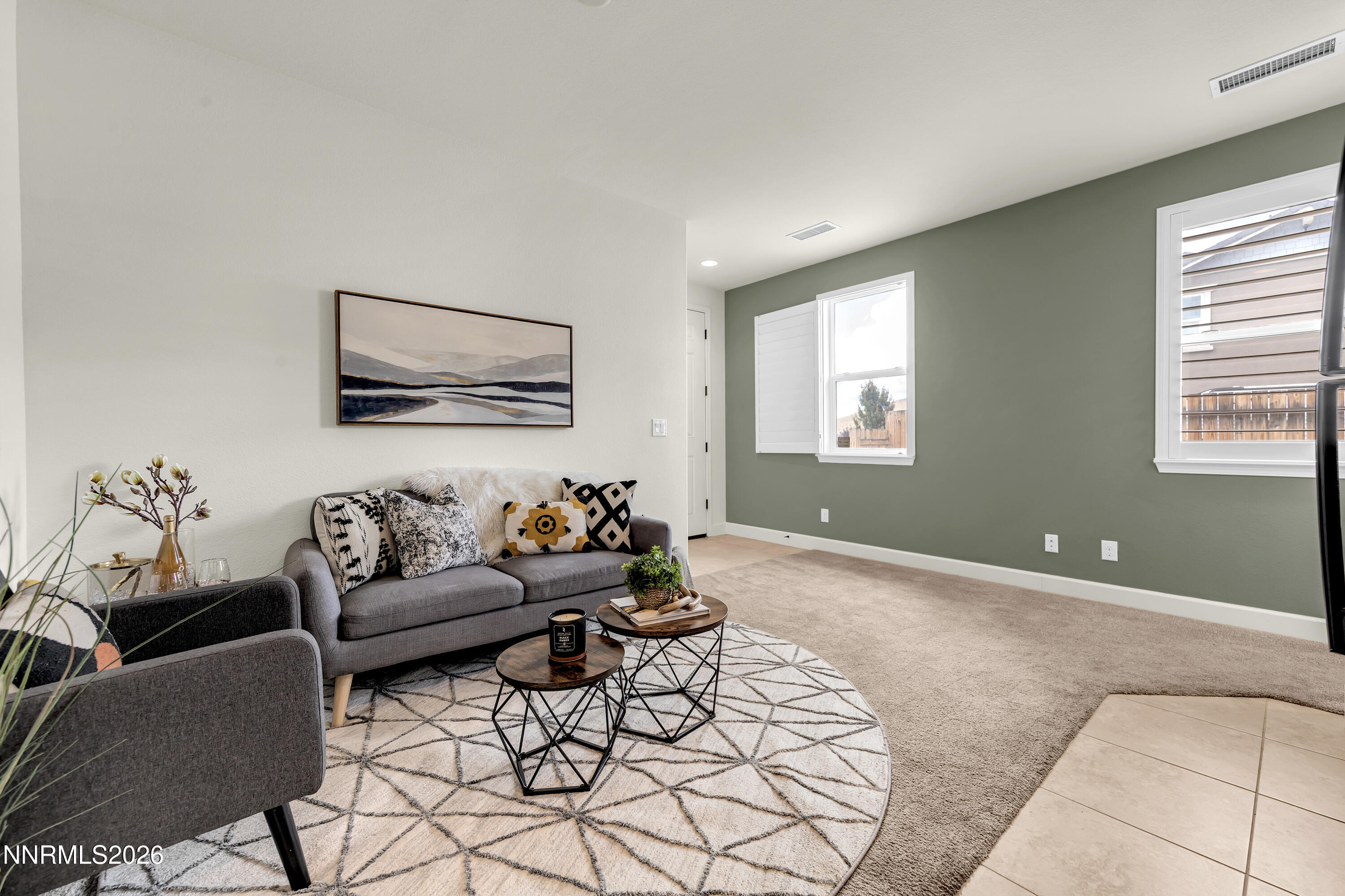 10150 Barrel Racer Drive Reno, NV 89521 - Photo 28 of 64 a living room with furniture and a window