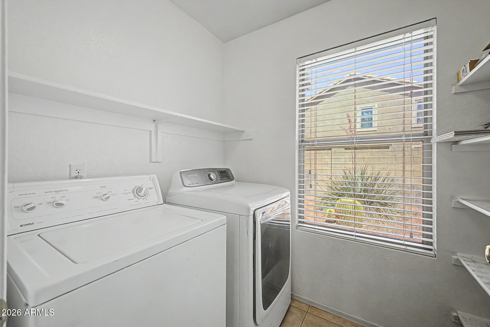 3489 South Bowman Road Apache Junction, AZ 85119 - Photo 22 of 24 a utility room with dryer and washer