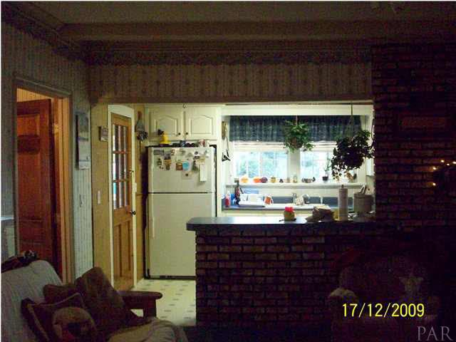 3950 Gobbler Road Century, FL 32535 - Photo 19 of 24 This is a view of the kitchen from the living room