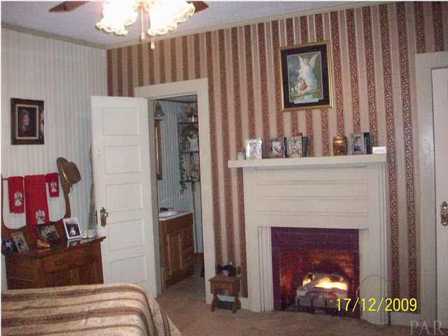 3950 Gobbler Road Century, FL 32535 - Photo 9 of 24 Notice the fireplace