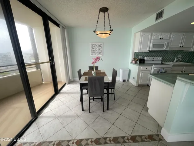 a view of cabinets with wooden floor