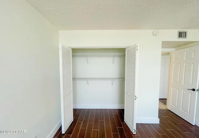 a view of balcony with furniture