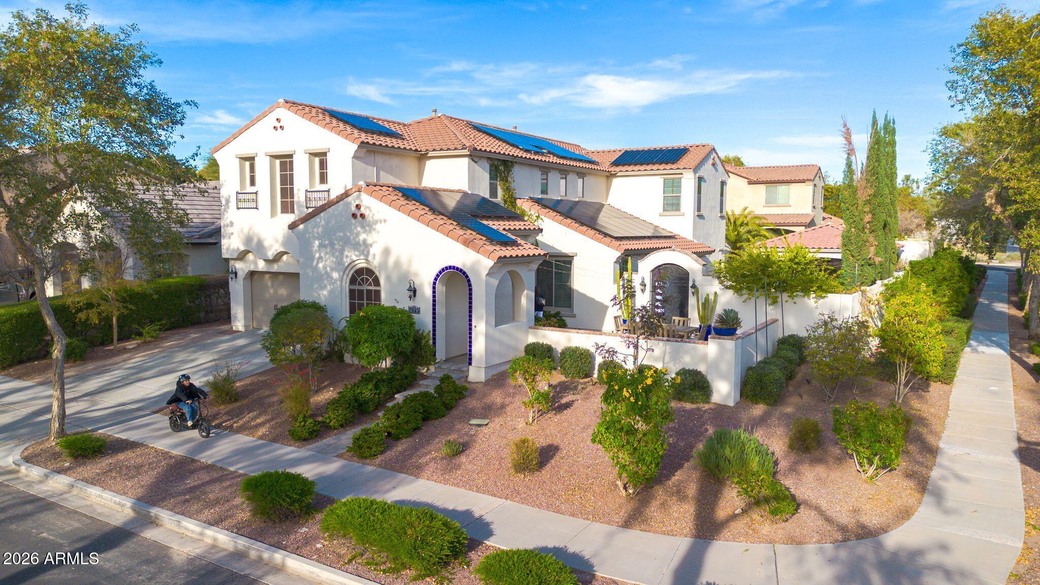 2985 North Point Ridge Road Buckeye, AZ 85396 - Photo 2 of 107 a front view of a house with a yard