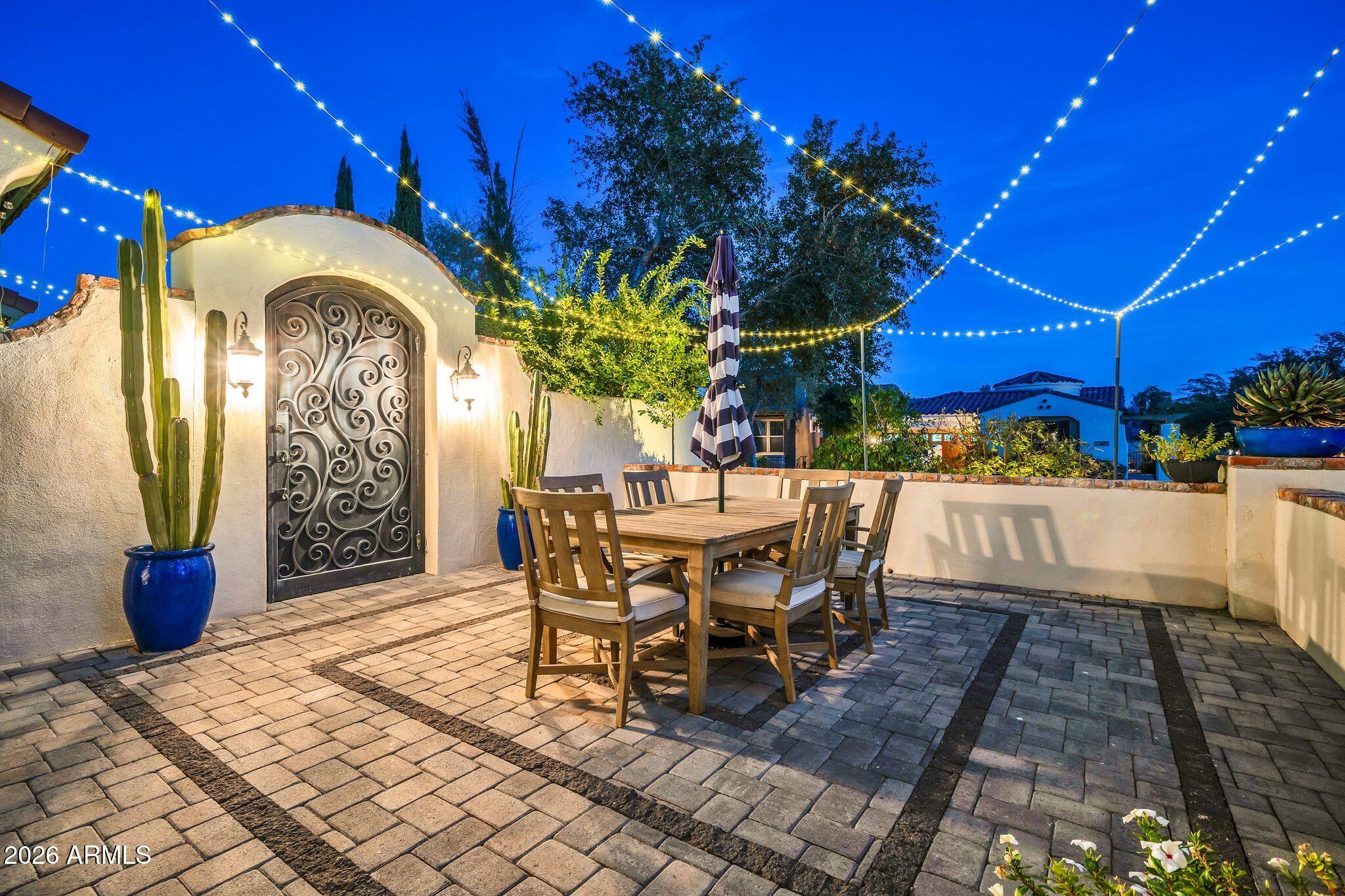 2985 North Point Ridge Road Buckeye, AZ 85396 - Photo 23 of 107 a view of a dinning table and chairs in patio
