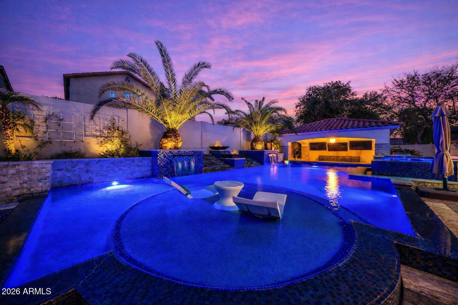 2985 North Point Ridge Road Buckeye, AZ 85396 - Photo 27 of 107 Pool at twilight