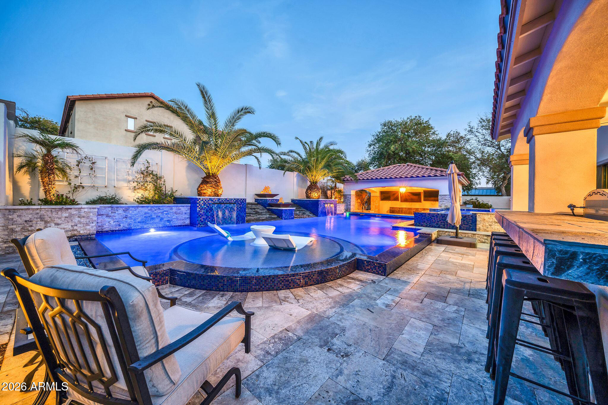 2985 North Point Ridge Road Buckeye, AZ 85396 - Photo 30 of 107 a view of a swimming pool with a lounge chairs