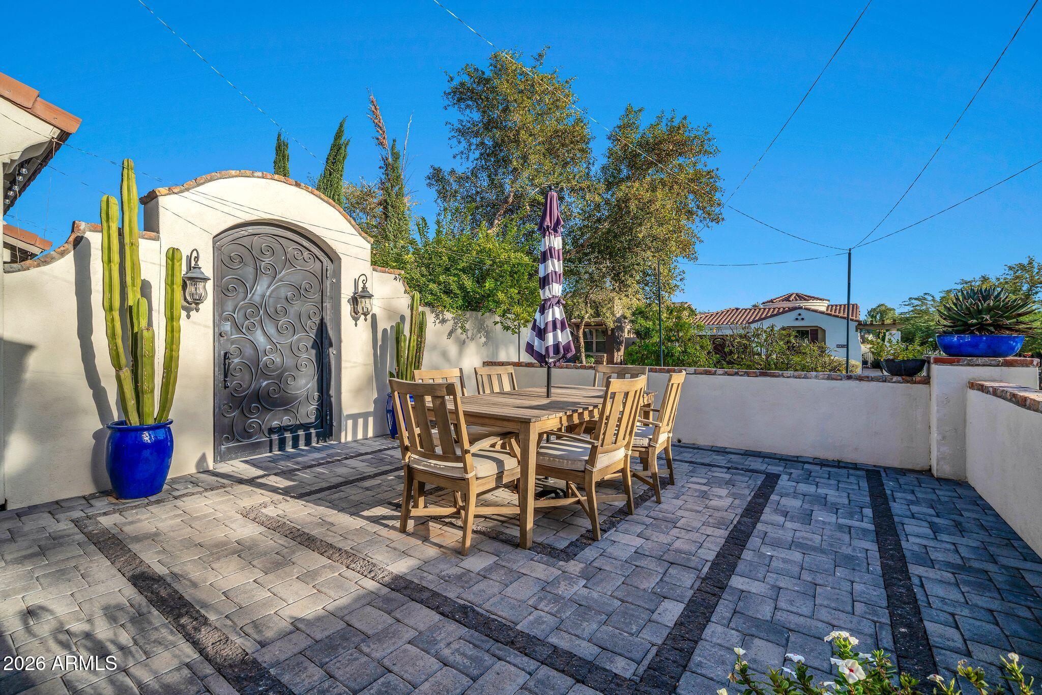 2985 North Point Ridge Road Buckeye, AZ 85396 - Photo 35 of 107 a view of a chairs and table in backyard