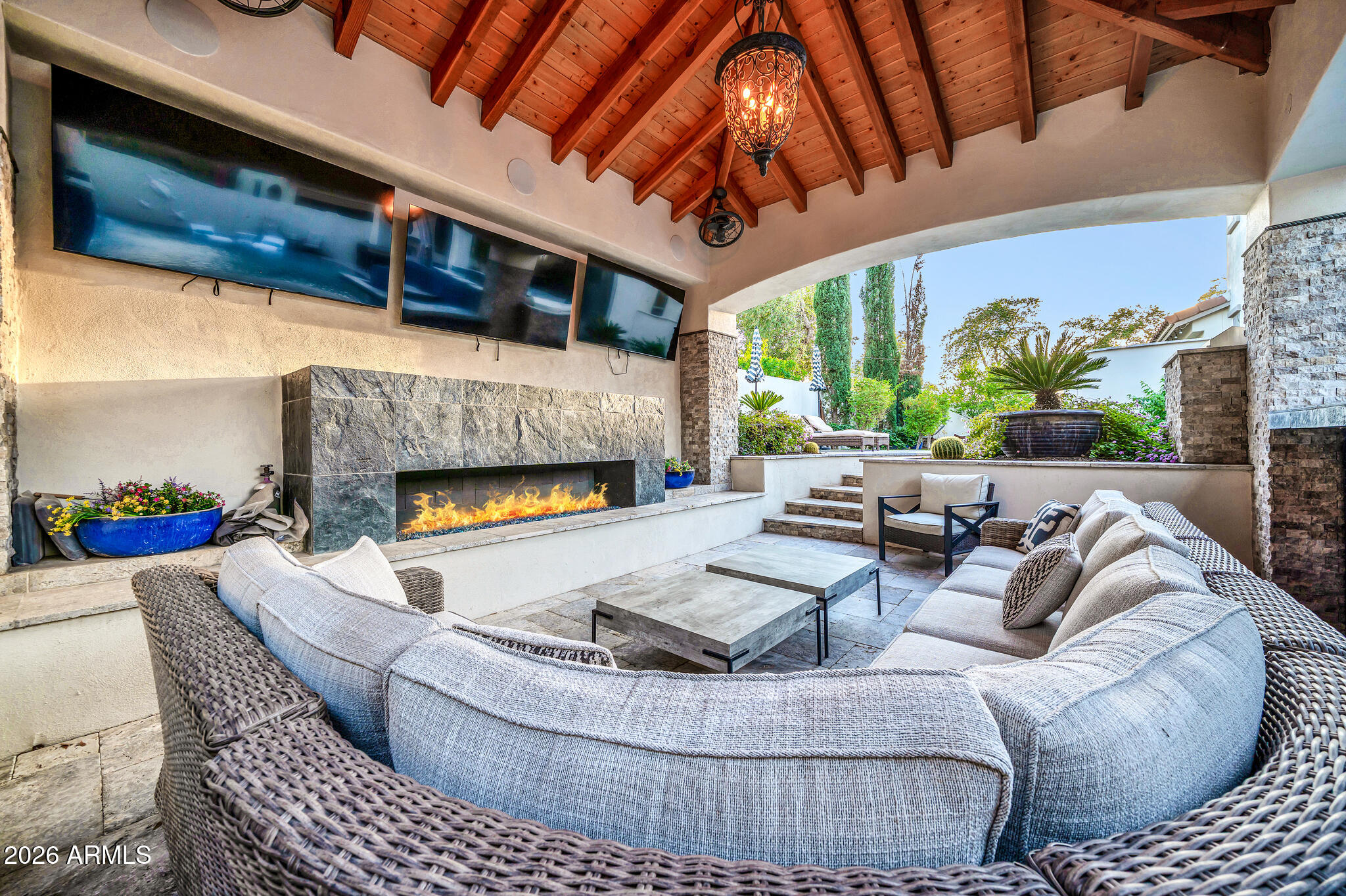 2985 North Point Ridge Road Buckeye, AZ 85396 - Photo 80 of 107 a living room with furniture and a fireplace