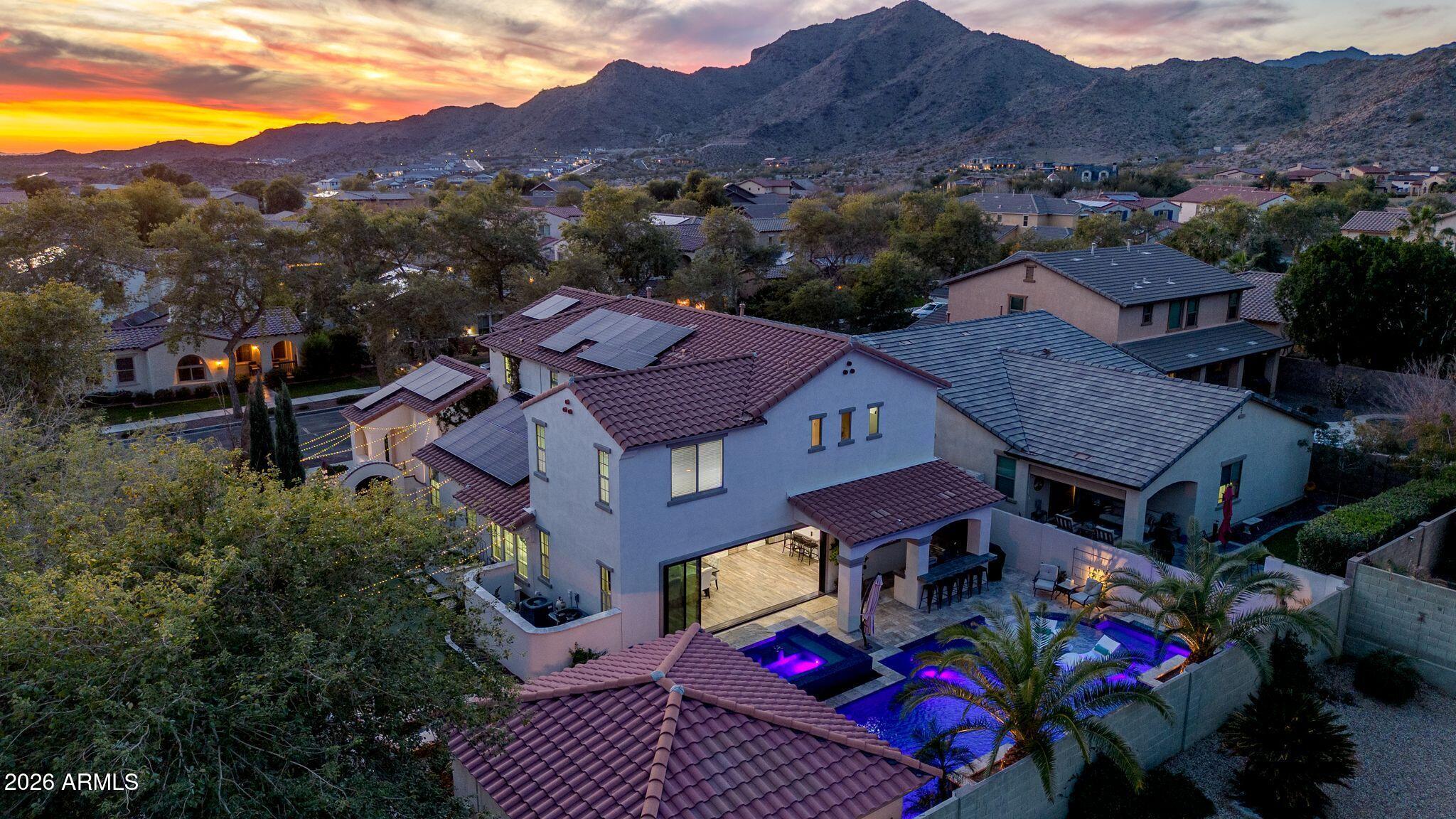 2985 North Point Ridge Road Buckeye, AZ 85396 - Photo 8 of 107 2985 N Point Ridge Rd Drone Twilight-11