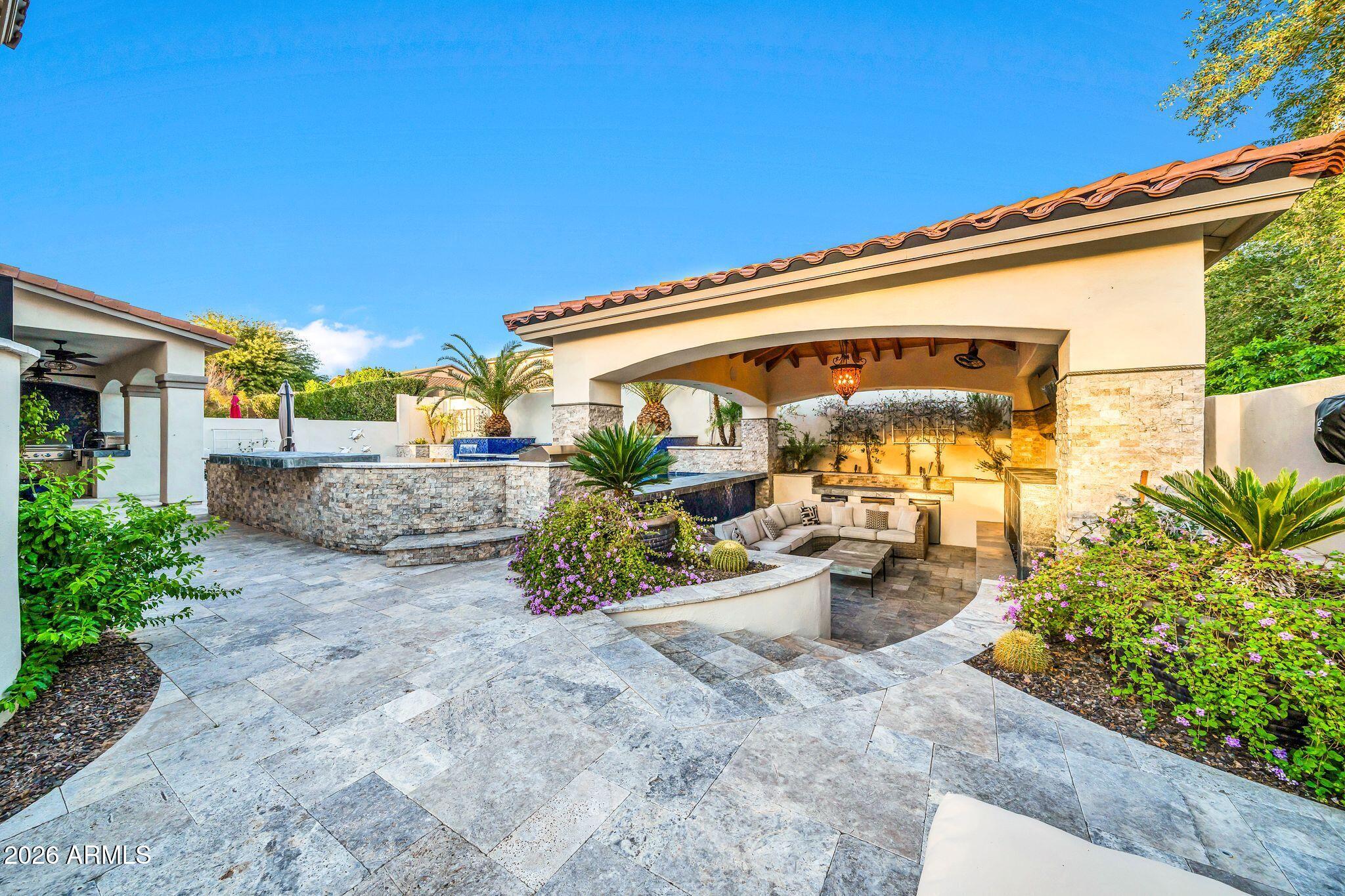 2985 North Point Ridge Road Buckeye, AZ 85396 - Photo 84 of 107 a view of a porch with potted plants