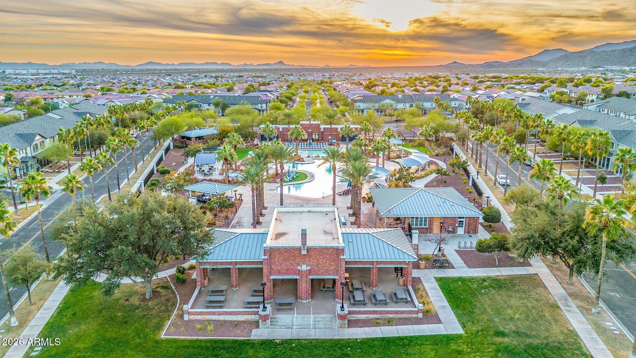 2985 North Point Ridge Road Buckeye, AZ 85396 - Photo 94 of 107 an aerial view of residential houses with outdoor space and ocean view