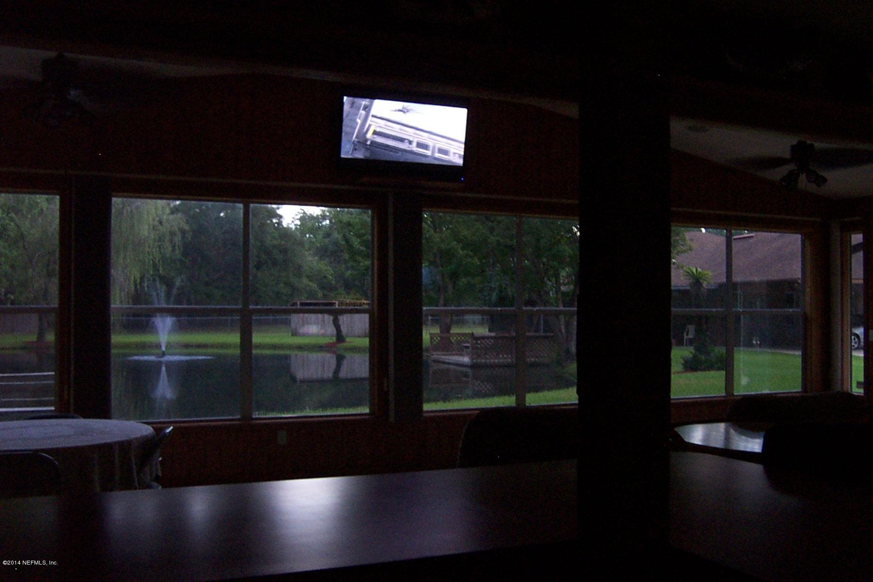 5191 Cedar Point Road Jacksonville, FL 32226 - Photo 45 of 107 S19-Guest House View from inside to pond