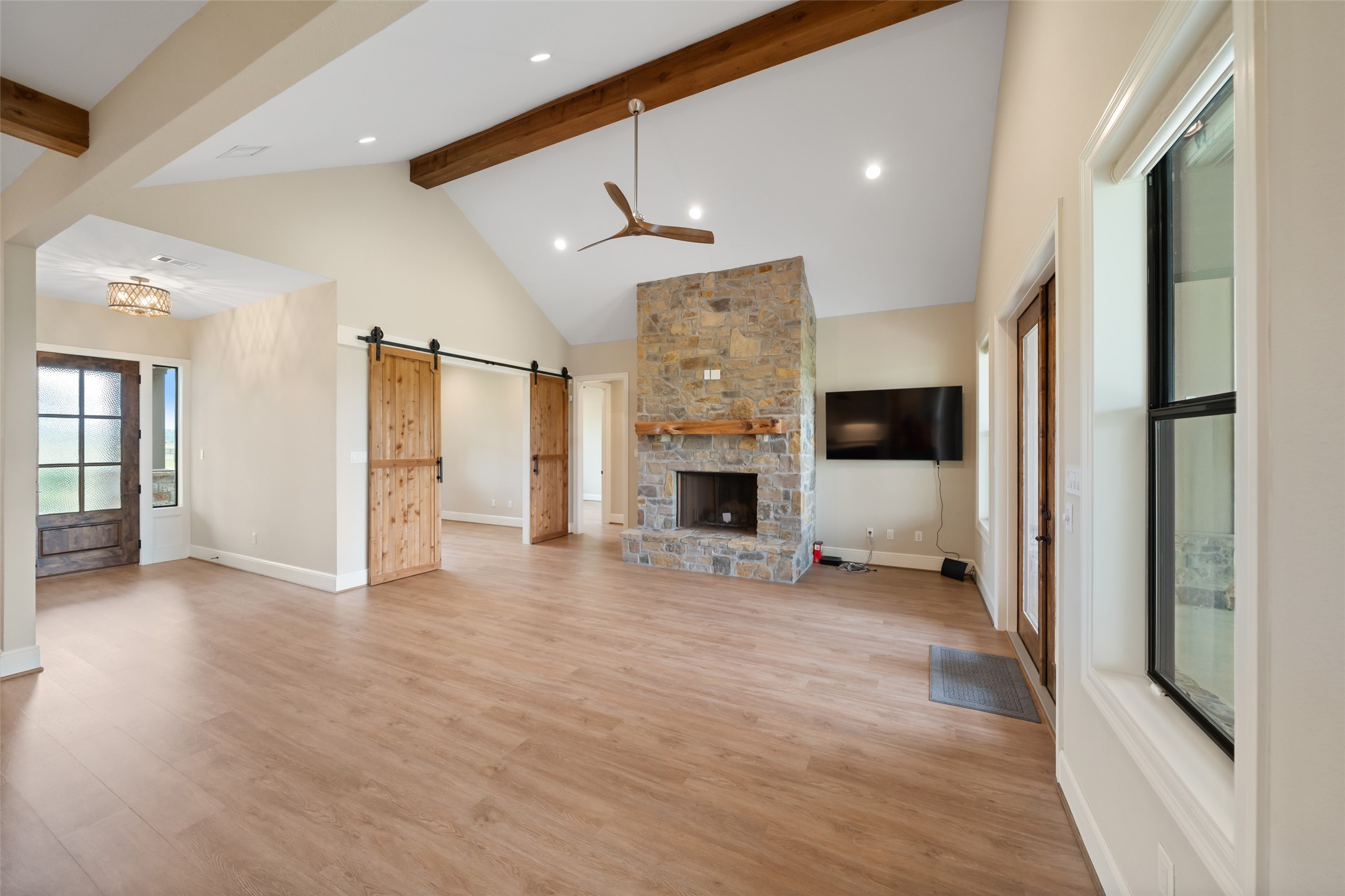 30163 High Spirit Ranch Road Hempstead, TX 77445 - Photo 13 of 49 a view of a livingroom with a fireplace and window