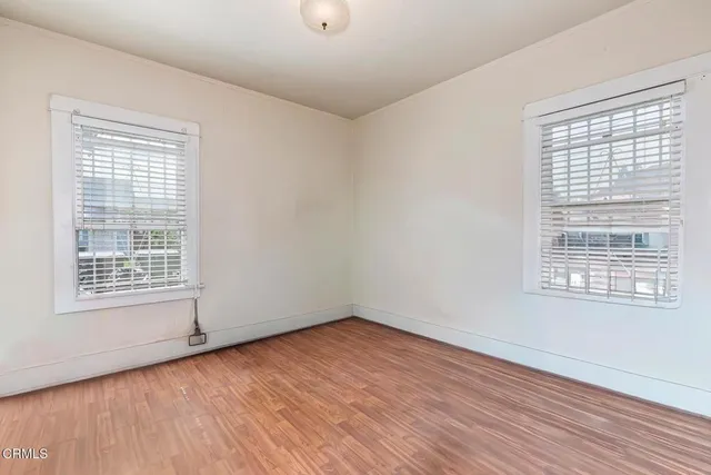 a bathroom with a sink a mirror toilet and bathtub