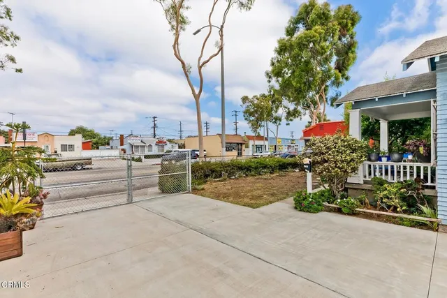 a view of a chairs and tables in the patio