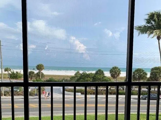 a view of a ocean from a balcony