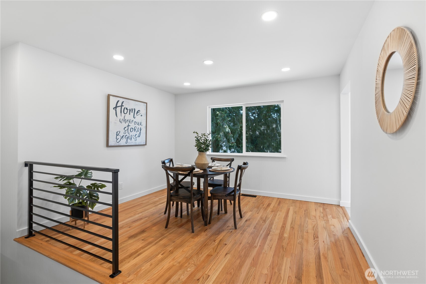 211 Southwest Langston Road Renton, WA 98057 - Photo 8 of 35 a view of a dining room with furniture window and wooden floor