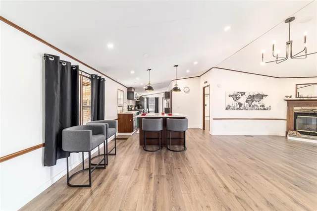 a view of a livingroom with wooden floor