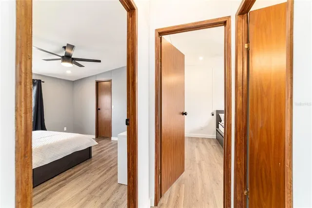 a bedroom with a bed and a table in it