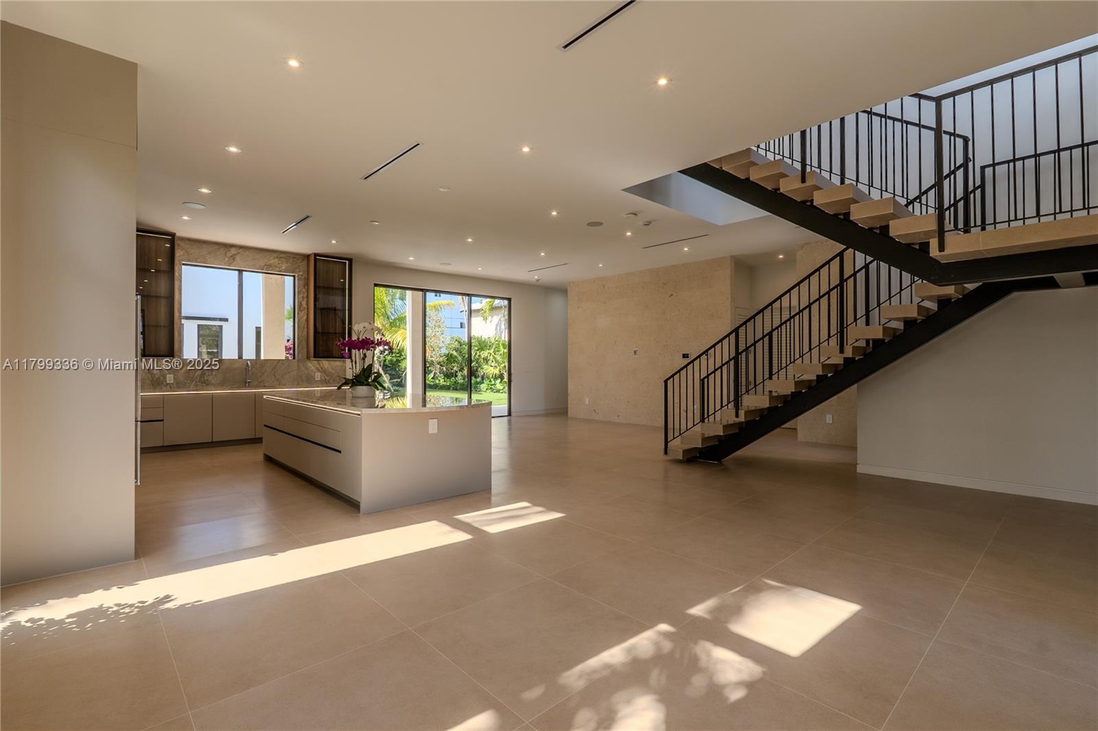 4231 Southwest 10th Street Miami, FL 33134 - Photo 12 of 35 a livingroom with furniture stairs and a living room